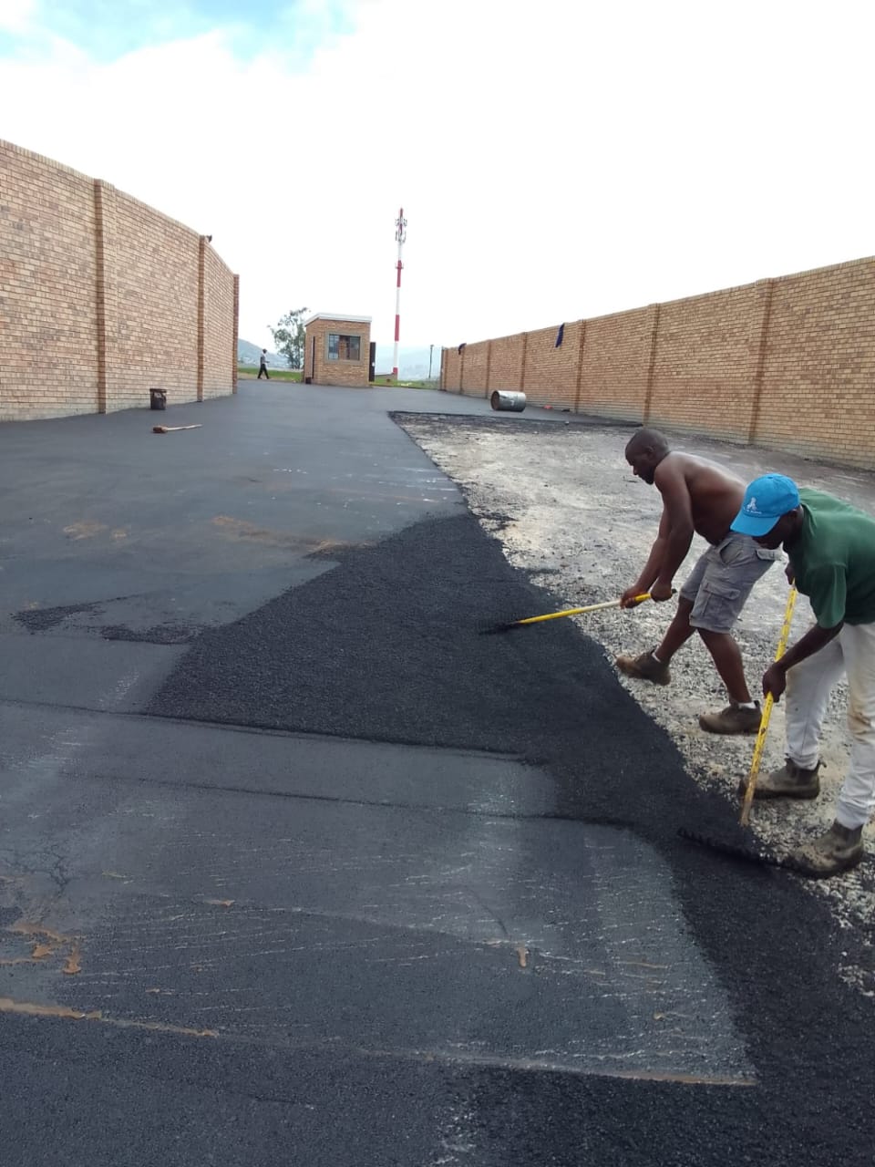 Laying fresh tar